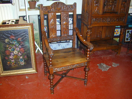 Renaissance-style cabinet and armchairs