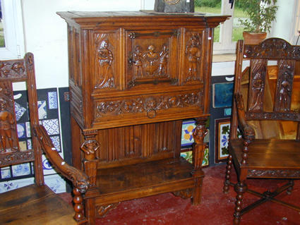 Renaissance-style cabinet and armchairs