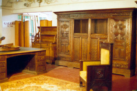 Desk, bookcase and armchair