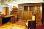 Desk, bookcase and armchair