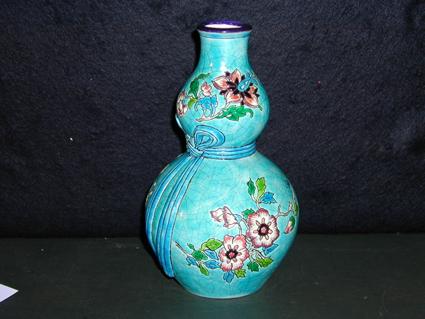 Vase bulbe en faïence de Longwy