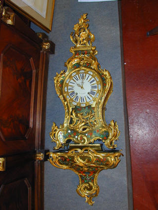 Louis XV wall clock and its console