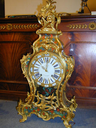 Louis XV wall clock and its console
